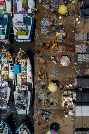 Aerial view of fishing boats and fish market in the south of Sri Lankaの写真素材