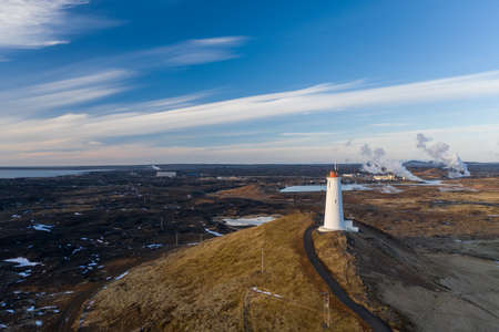 Aerial view of the lighthouse at Reykjanes Peninsula during sunset. Iceland in early springの写真素材