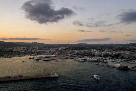 Aerial view of the old city on the island of Ibiza during sunset.の写真素材