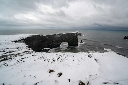 Unique basalt arch on Dyrholaey cape. Nature Reserve, Iceland.の写真素材