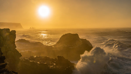 View from cape Dyrholaey, Iceland. Stormy sunriseの写真素材