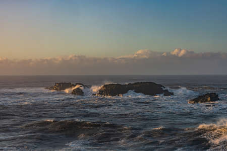 View from cape Dyrholaey, Iceland. Stormy sunriseの写真素材