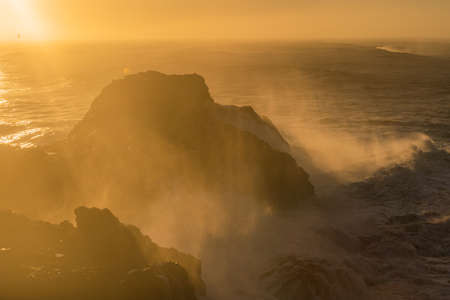 View from cape Dyrholaey, Iceland. Stormy sunriseの写真素材