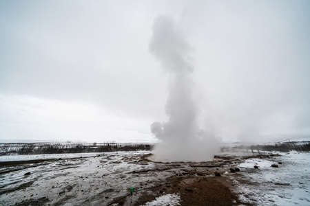 Strokkur (Icelandic, churn), one of the most famous geysers located in a geothermal area beside the Hvita River in the southwest part of Iceland, erupting once every 6â10 minutesの写真素材