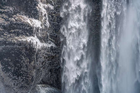 The famous Skogafoss waterfall in the winter at sunrise. One of the most popular places in Icelandの写真素材