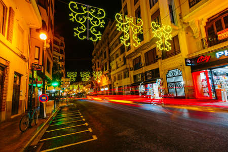 View of the evening streets with illumination timed to the Fallas festival in Valencia, Spain 2018のeditorial素材