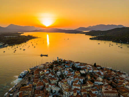 Aerial view of the Kastro mountain church and city on the island of Poros during sunset. Greece in the summerの写真素材