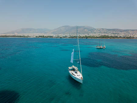Aerial view of a sailing yacht near the Greek islands