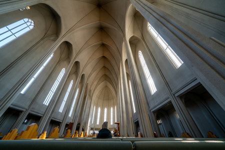 REYKJAVIK, ICELAND - April 02, 2019 Tall Columns Windows Wooden Organ Ceiling Hallgrimskirkja Large Lutheran Church Reykjavik Iceland. Largest church and tallest structure in Iceland.のeditorial素材