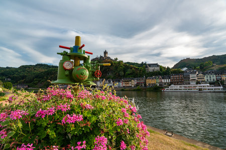 Scenic View of Cochem Castle with Vibrant Flowers in Summerの写真素材