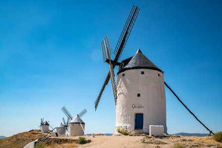 Iconic Consuegra Windmills Against a Clear Blue Sky, Spainの写真素材