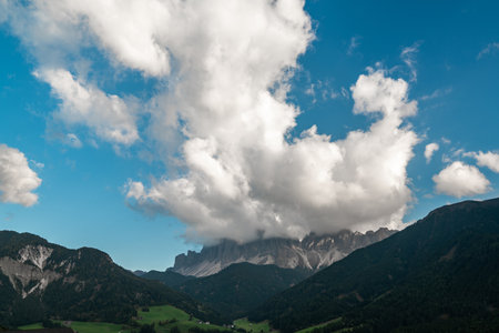 Breathtaking View of the Alps with Dramatic Clouds, Italyの写真素材