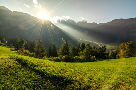 Breathtaking Sunrise Over the Alpine Landscape in Italyの写真素材