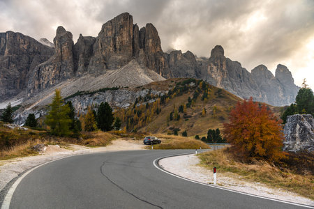 Scenic Mountain Road in the Italian Alps during Autumnの写真素材
