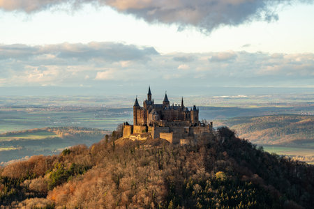 Majestic Hohenzollern Castle Amidst Autumn Colors in Germanyの写真素材