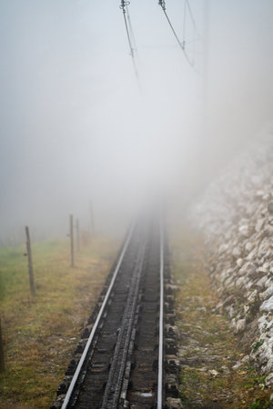 Mystical Fog on Pilatus Mountain Railway in Autumn, Switzerland