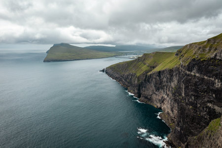 Breathtaking Aerial View of Faroe Islands Cliffs and Oceanの写真素材