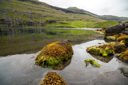 Aerial Panorama of Serene Faroe Islands Landscape at Summers Endの写真素材