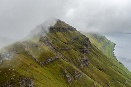 Aerial Panorama of Dramatic Cliffs in the Faroe Islands at Summers Endの写真素材