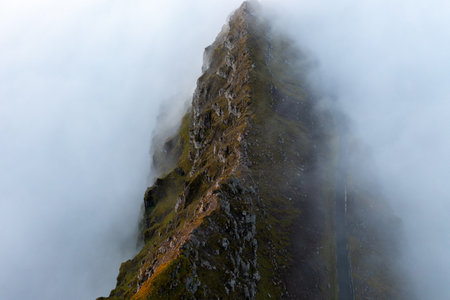 Aerial View of Majestic Mountains in Foggy Faroe Islandsの写真素材