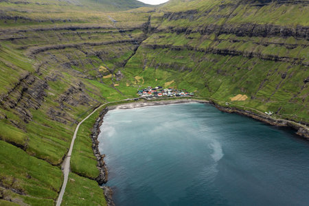 Aerial View of Serene Coastal Village in Faroe Islands at Summers Endの写真素材