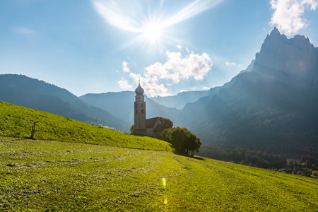 Scenic Autumn Landscape in the Italian Alps with Churchの写真素材