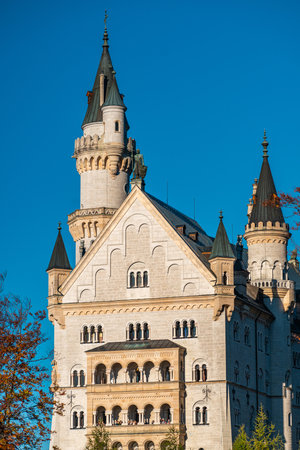 Neuschwanstein Castle in Serene Autumn Lightの写真素材