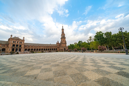 Breathtaking Plaza de Espaa in Seville, Spain Under a Dramatic Skyの写真素材