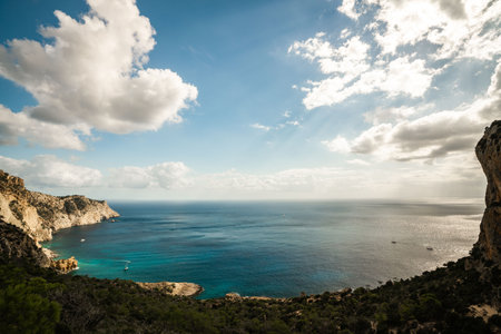 Breathtaking Coastal View of Ibizas Crystal Clear Watersの写真素材