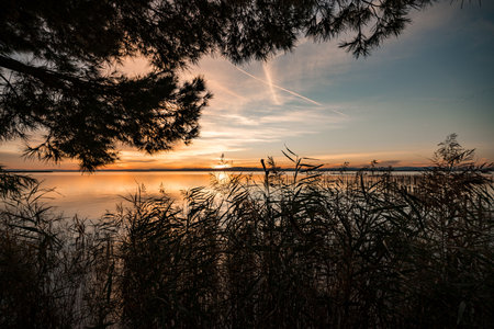Sunset Serenity Over Lake Albufera, Spain: Natures Breathtaking Viewの写真素材