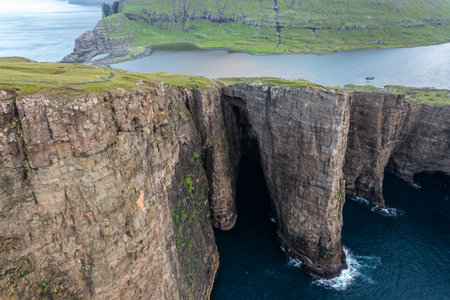 Stunning Aerial View of Faroe Islands Cliffs and Seaの写真素材
