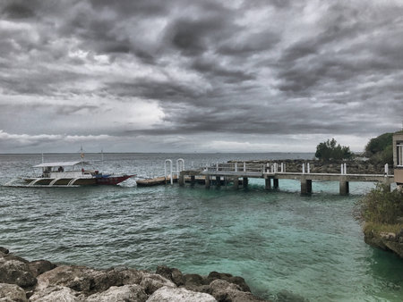 Fantastic view of Ocean and Outrigger boatの写真素材