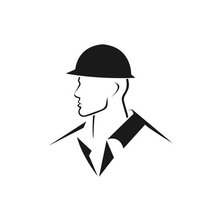 A builder, mechanic or tech man side profile. Work man in helmet or maintenance worker side profile silhouette. A builder, mechanic, plumber or electrician icon. Vector illustrationのイラスト素材
