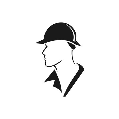 A builder, mechanic or tech man side profile. Work man in helmet or maintenance worker side profile silhouette. A builder, mechanic, plumber or electrician icon. Vector illustrationのイラスト素材