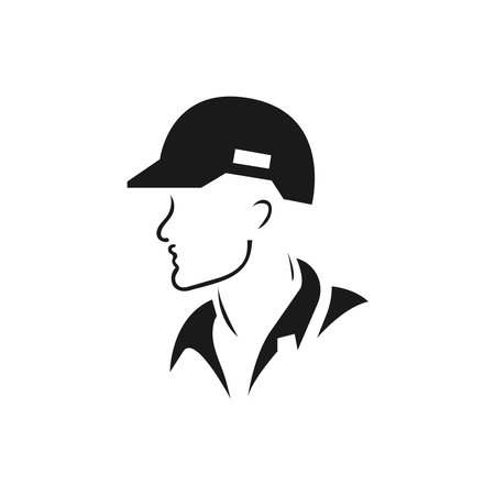 A builder, mechanic or tech man side profile. Work man in helmet or maintenance worker side profile silhouette. A builder, mechanic, plumber or electrician icon. Vector illustrationのイラスト素材