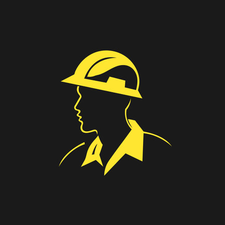 A builder, mechanic or tech man side profile. Work man in helmet or maintenance worker side profile silhouette. A builder, mechanic, plumber or electrician icon. Vector illustrationのイラスト素材
