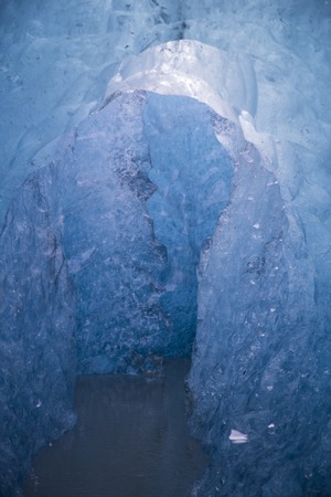 Crystal Ice Cave hollowed out by melt water in the glacier, Icelandの写真素材