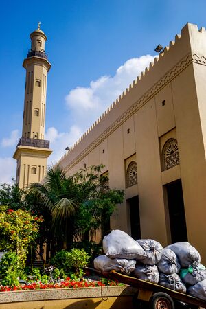 Minaret and building of the Grand Bur Dubai Masjid mosque in the Bur Dubai district of Dubai in the United Arab Emiratesの写真素材