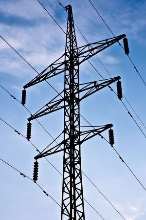electric transmission line on blue sky background with cloudsの写真素材