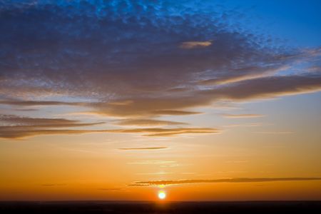 photo of the blue sky with cloudsの写真素材
