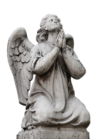 Beautiful statue of the angel praying. Isolated on white backgroundの写真素材