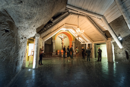 Krakow, Poland - May 16, 2013. Tourists visiting Wieliczka Salt Mine in Krakow, Poland, Europe. People in underground chamber.のeditorial素材
