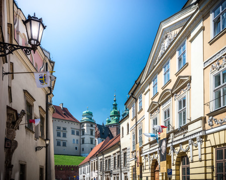 Krakow, Poland - May 16, 2013. Stree near beautiful Wawel castle in Krakow, Poland, Europe. Summer with blue sky. Tourist destination.のeditorial素材