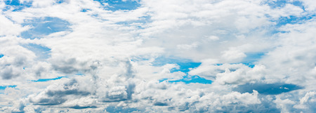 Panorama of beautiful blue sky with white cloudsの写真素材
