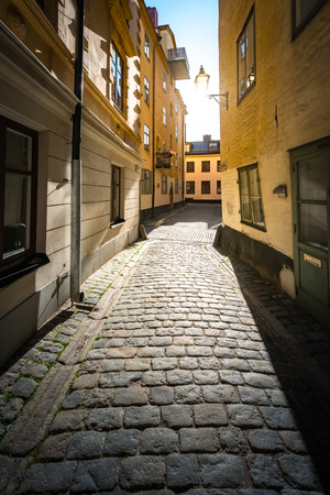 Old and narrow town street in Gamla stan, Stockholm, Sweden, Scandinavia, Europeの写真素材