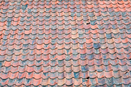 Old tiled roof. Top of building. Architecture of Norway, Scandinavia, Europe.の写真素材