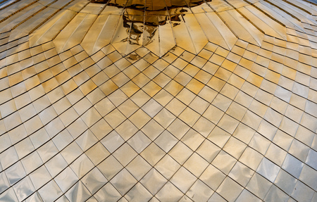 Detailed view of church golden dome. Reflection on metal. Russian architectureの写真素材
