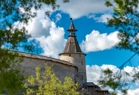 Pskov kremlin tower with blue cloudy sky in backgroundのeditorial素材