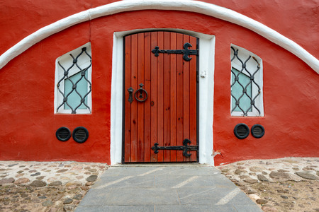 Old church entrance doors in Russia, Europe. Old architecture. Faith and religion.