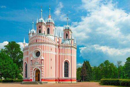 Old beautiful church in Saint Petersburg with blue cloudy sky in backgroundの写真素材